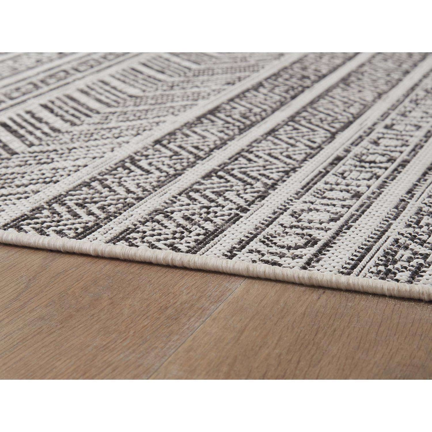  Signature Design By Ashley Brinoy 94 In. W X 122 In. L Black/White Geometric Polypropylene Rug